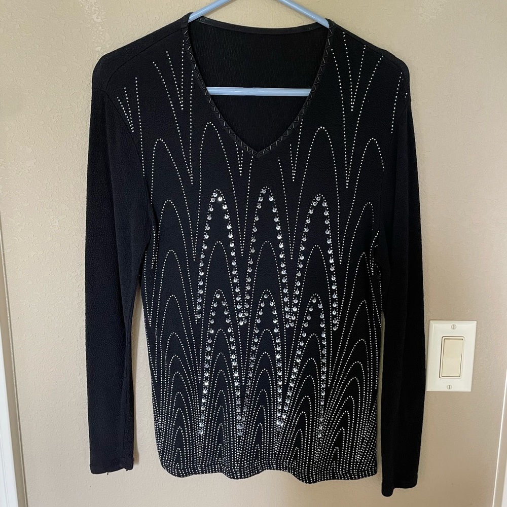 Black shirt with sequence on the front